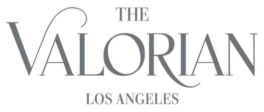This is a logo for The Valorian Los Angeles, featuring elegant gray typography on a black background. logo on footer section.